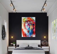 Colorful lion painting on a black wall above a bed in a modern bedroom.