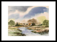 By the river