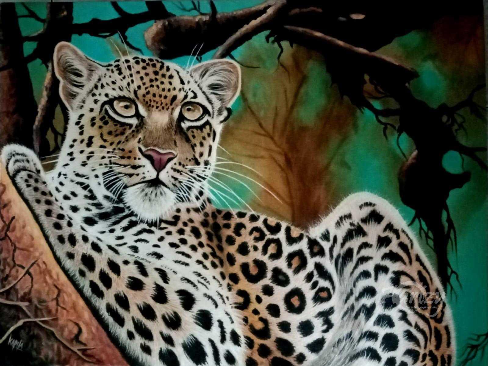 Leopard Perched in the Treetops