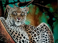 Leopard Perched in the Treetops